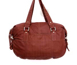 Vogue Crafts and Designs Pvt. Ltd. manufactures Formal Brown Handbag at wholesale price.